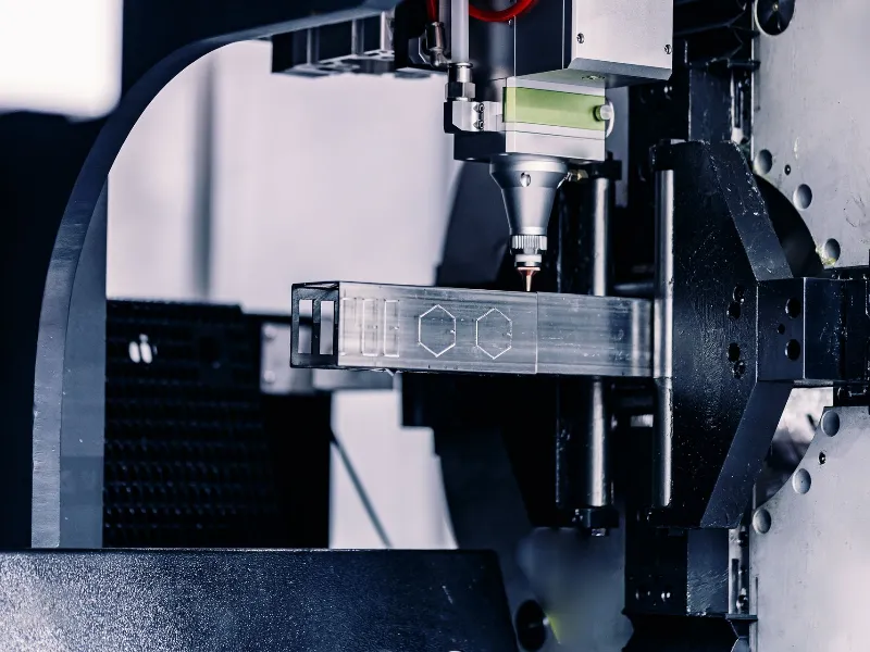 Laser CNC cut of metal with light spark